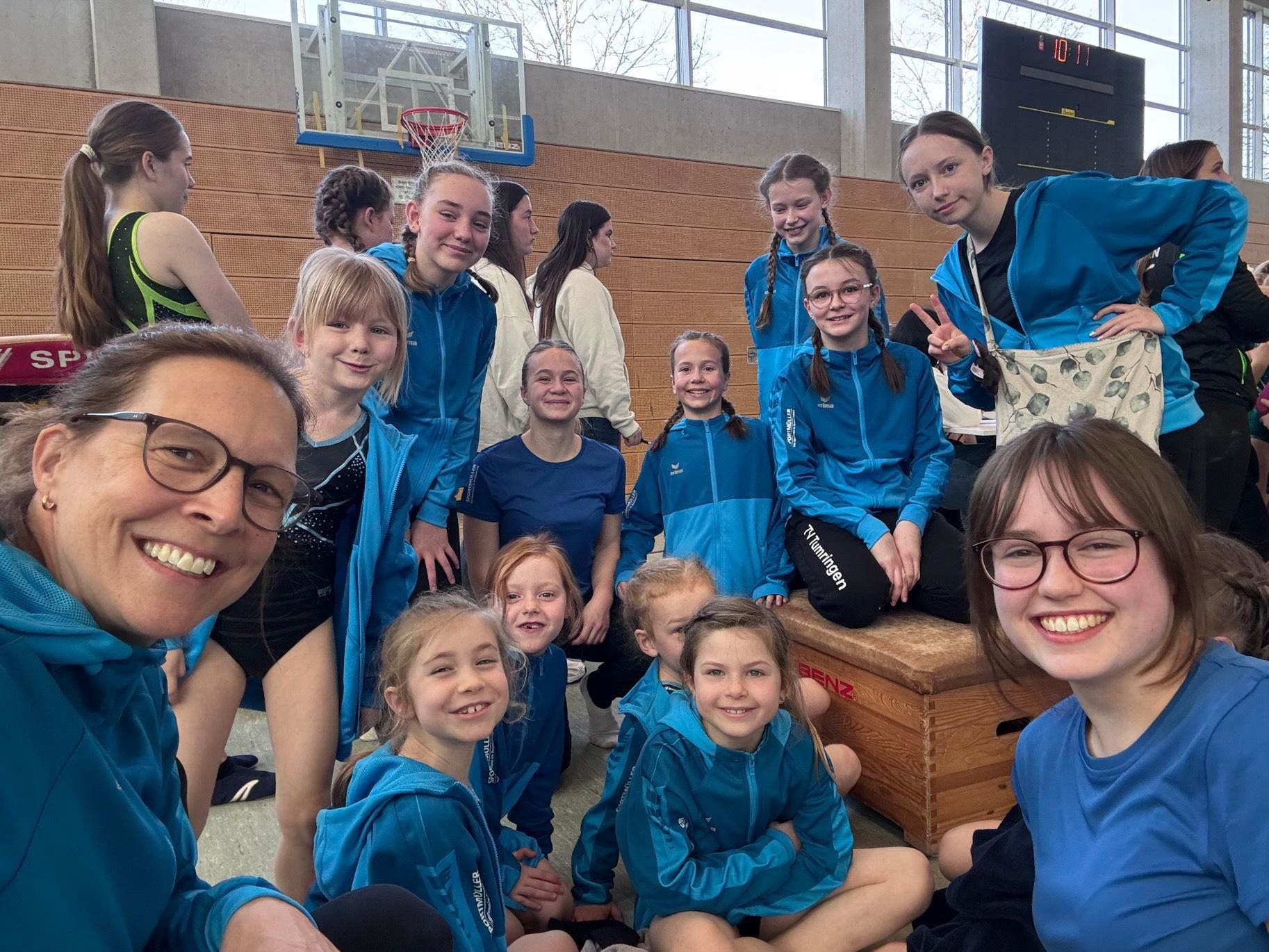 Child admiring Christmas tree decorations